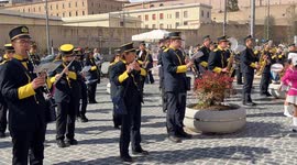 Some majorettes and a musical band during the passage of the runners in Piazza Risorgimento during the Acea Run Rome The Marathon in Rome.