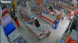 Car crashes into shop in Brazil, leaving staff injured and tills destroyed