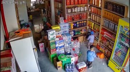 Young boys smash 23 bottles of alcohol in Chinese supermarket leaving mother embarrassed