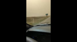 Vehicles toppled on the roadside in Amarillo, Texas