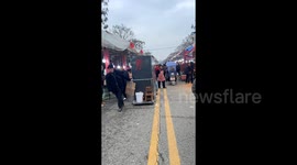 Entrepreneurial pensioner turns heads with DIY mobile toilet stall at bustling market