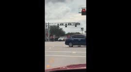 People Help Driver Stuck on Train Tracks