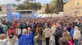 Overview of a part of Piazza del Popolo full of people applauding at the end of Lella Costa's speech during the demonstration 'A Square for Europe' promoted by the journalist Michele Serra in Rome.