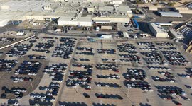 Aerial view of the Ford Motor Company automotive company in the Hermosillo industrial park, Sonora Mexico. Hundreds of new cars ready and arranged in order in the yard to be transported in train cars to the Automotive Industry market in the USA. Hermosill