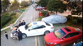 Police and locals lift up car to rescue 5-year-old boy trapped underneath