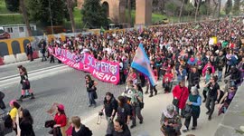 People marching in the procession of the feminist and transfeminist movement Non Una di Meno (Not One Less) on the occasion of International Women's Day in Rome.