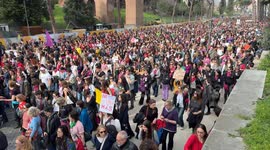 People marching in the procession of the feminist and transfeminist movement Non Una di Meno (Not One Less) on the occasion of International Women's Day in Rome.