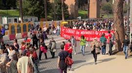 People marching in the procession of the feminist and transfeminist movement Non Una di Meno (Not One Less) on the occasion of International Women's Day in Rome.