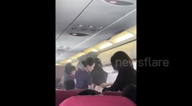 Hong Kong Airlines flight makes emergency landing after overhead compartment fire