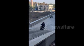 China: Charge and Push To Get The Scooter Uphill
