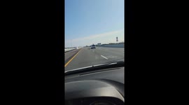 Passenger Rides Atop Speeding SUV