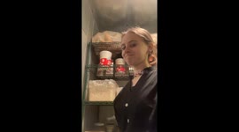 Person falls while reaching for a bag of bread in Chatham, United Kingdom