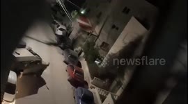 Israeli forces raid homes during a military incursion into the southern area of Hebron