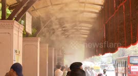 Cooling bus stop installed in India to help locals beat scorching heat