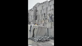 Satisfying footage shows HUGE granite slab being knocked over at quarry in Norway