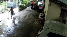 Pensioner sweeping her driveway survives landslide that engulfs her home