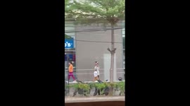 Heartwarming moment toddler takes pictures for his posing mother