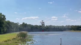 US: Helicopter Battles Brush Fire in Martin County