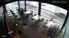 Missile strike in Kyiv caught on camera, diners shield waitress in act of bravery