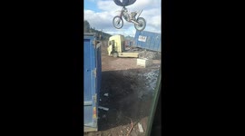 Crane plays with discarded motorcycle before disposing of it in Borlänge, Sweden