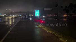US: Stormy Weather Floods Vehicles in Texas