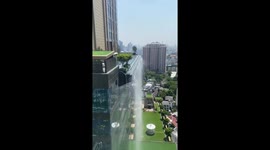 Water spills from pool as Thailand earthquake rattles building