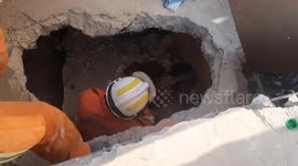 Medics treat seriously injured monk buried under Myanmar earthquake debris