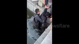 China: Bringing the Elderly Man Back to Shore