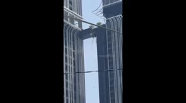 Hero father leaps across collapsing building to save family during earthquake