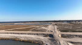 Aerial footage over a new residential area built entirely on reclaimed land to the east of Amsterdam, Netherlands