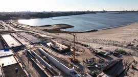 Aerial footage of a construction site on the new neighborhood of Ijburg built on reclaimed land to the east of Amsterdam, Netherlands