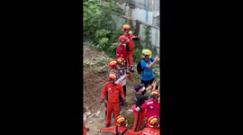 Chinese rescuers cheer as Myanmar earthquake survivor is recovered from flattened hotel