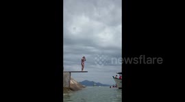 Woman Belly Flops While Swimming In Brazil