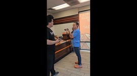 Motorist refuses to move car despite being confronted by several drivers blocked by his vehicle