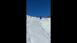 Skis Fly Off Skier Mid-Flip