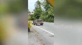 Wonky tractor without driver wobbles on roadside