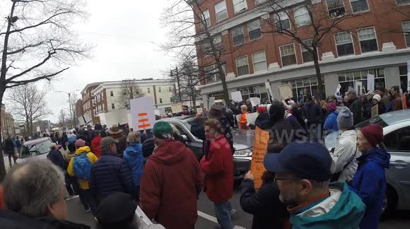 Hands Off Protestors Marching Down Washington Street in Salem, Massachusetts