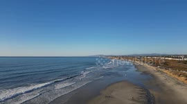 Carlsbad State Beach Campground flyover and surf watch over pacific ocean