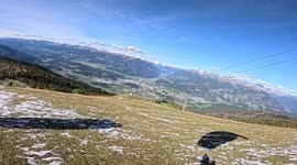 Speedflying at 60MPH inches above the ground down a South Tirol ski slope