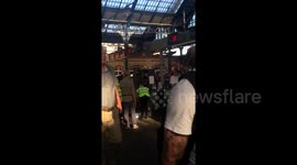 Water handed out to stranded commuters after Brighton Station was closed