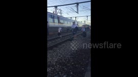 DUPLICATE Eurostar passengers evacuated across train tracks near Paris