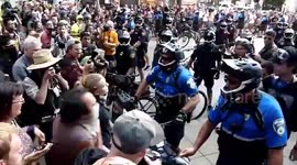 Cleveland police push protesters using bikes