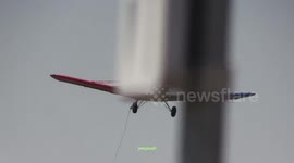 Plane picks up a double banner