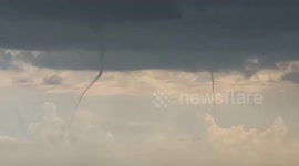 Rare twin tornadoes touch down in Manitoba, Canada
