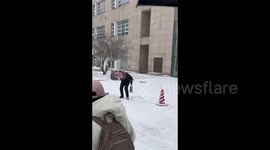 China: A Man Wearing a Traffic Cone on His Head