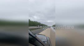 US: Kayakers Paddle Down Flooded I-57 Near Jacksonville