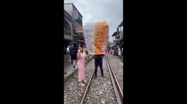 Chinese lantern release goes wrong when it hits power lines and house