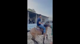 A man fell while riding a horse at an Indonesian racecourse