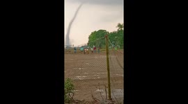 Waterspout tornado stretches through the sky in Myanmar