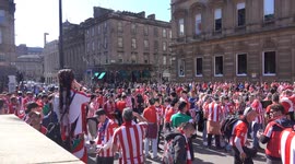 Athletic bilbao fans celebrate ahead of tonights game in george square in the counting house pub outdoor beer garden
